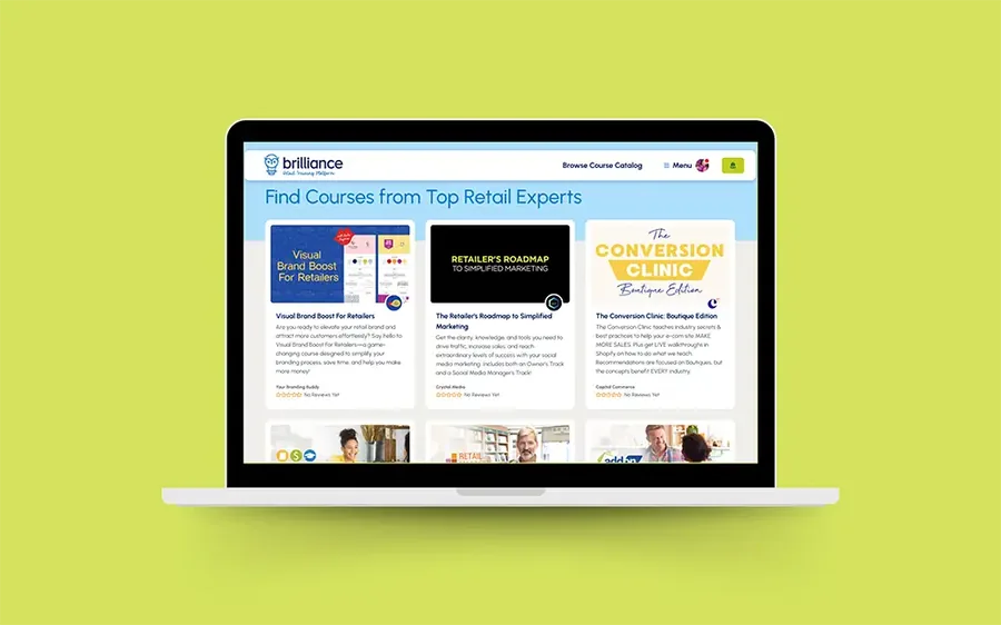 The Brilliance course catalog on a laptop screen